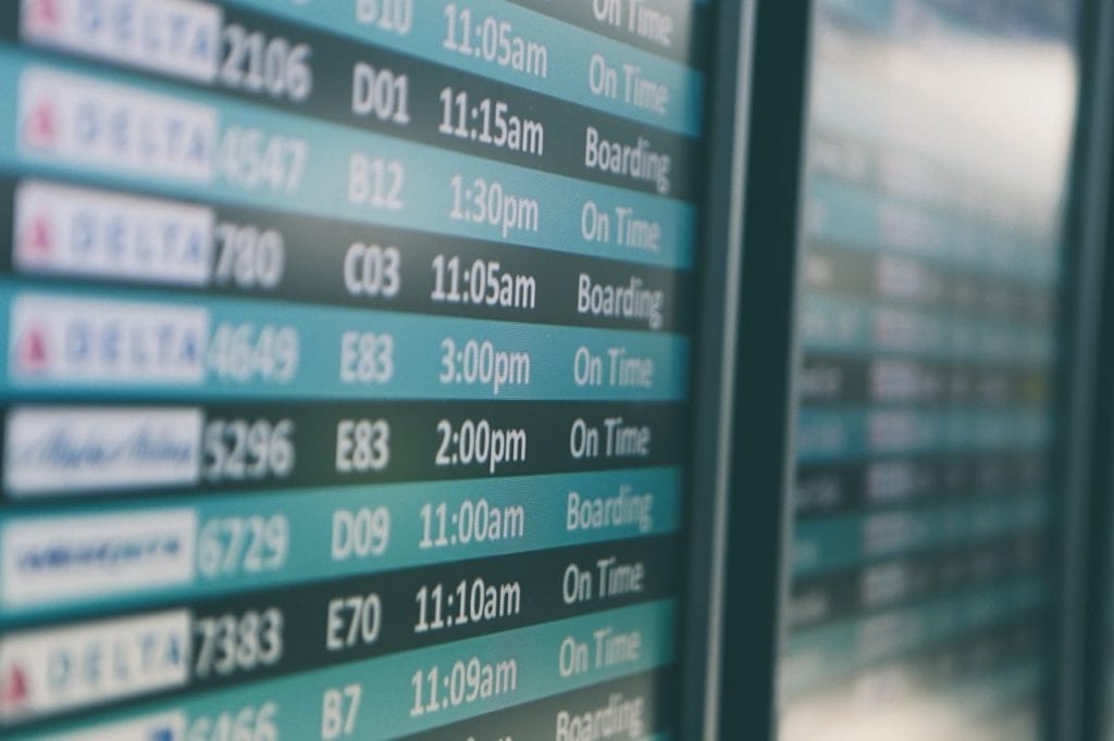 A departure board in an airport.