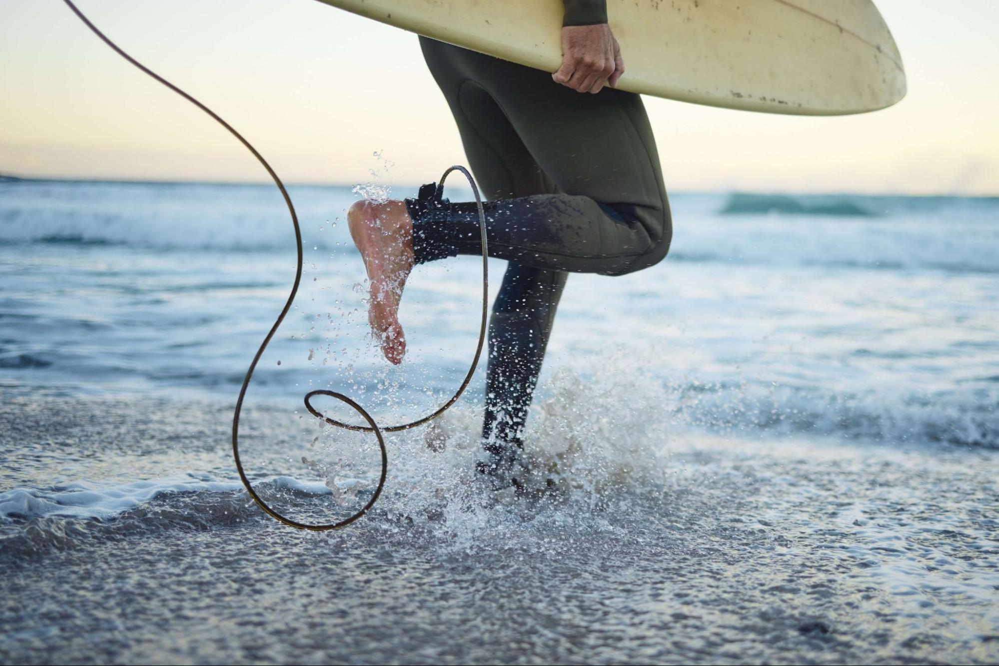 A person enjoying Surfing Lessons​.