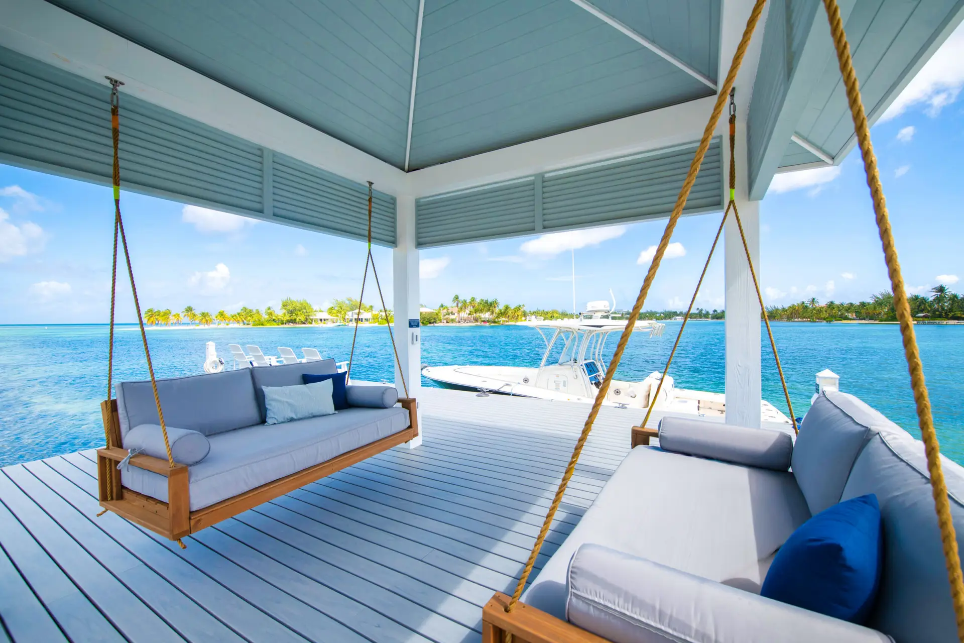 Private dock with cabana and boat pickup at a Cayman Kai vacation rental near Stingray City